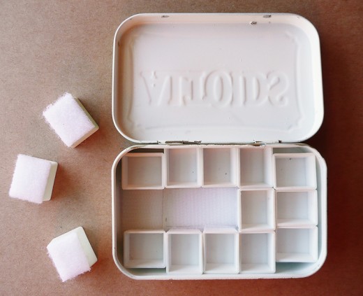 Altoids watercolor kit with half-pans attached with velcro tape